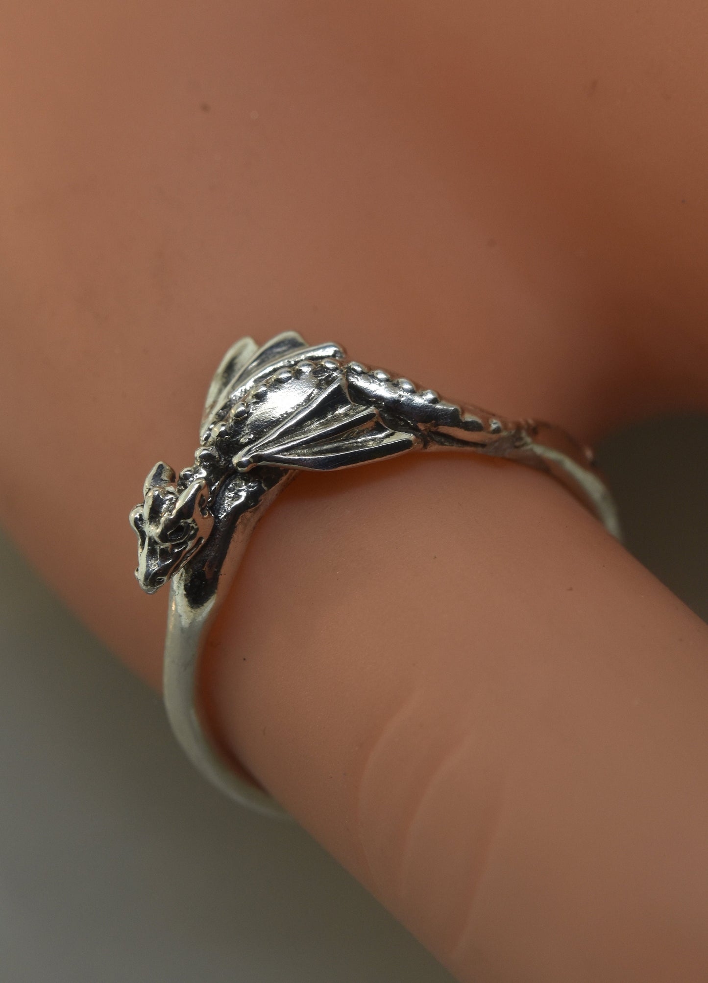 Baby dragon ring with moissanite and green sapphires